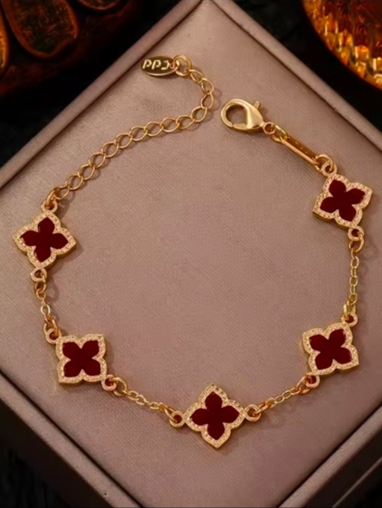 Anthropologie Jewelry - Gold-Tone Bracelet with Red Clover Motifs